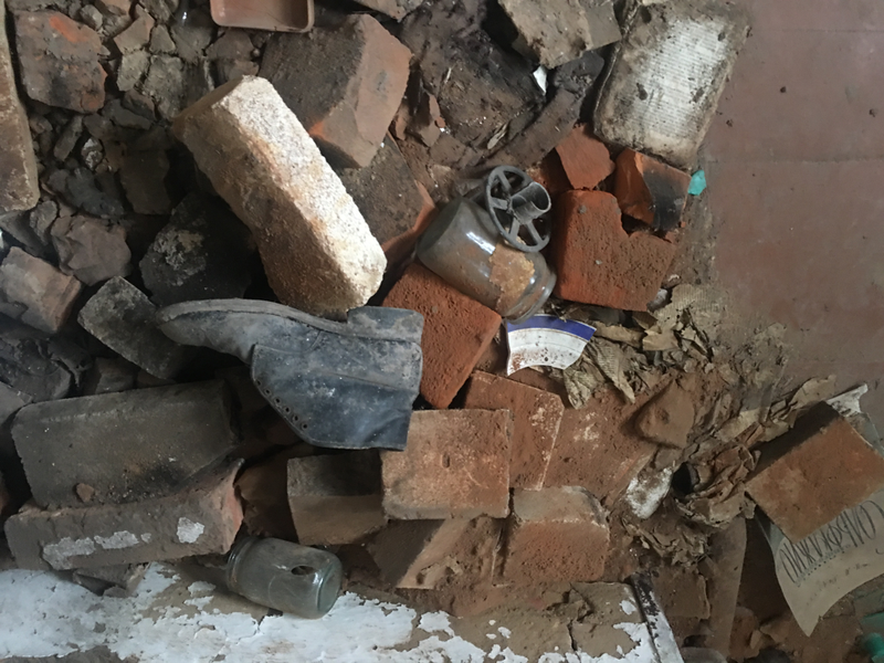 A shoe that looks like it could fit a small child inside an abandoned home. I wonder where he or she is today? (Terrell Jermaine Starr/The Root)